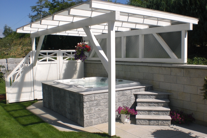 hot tub enclosure with pergola and privacy wall